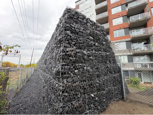 Anti-collision wall for train derailments